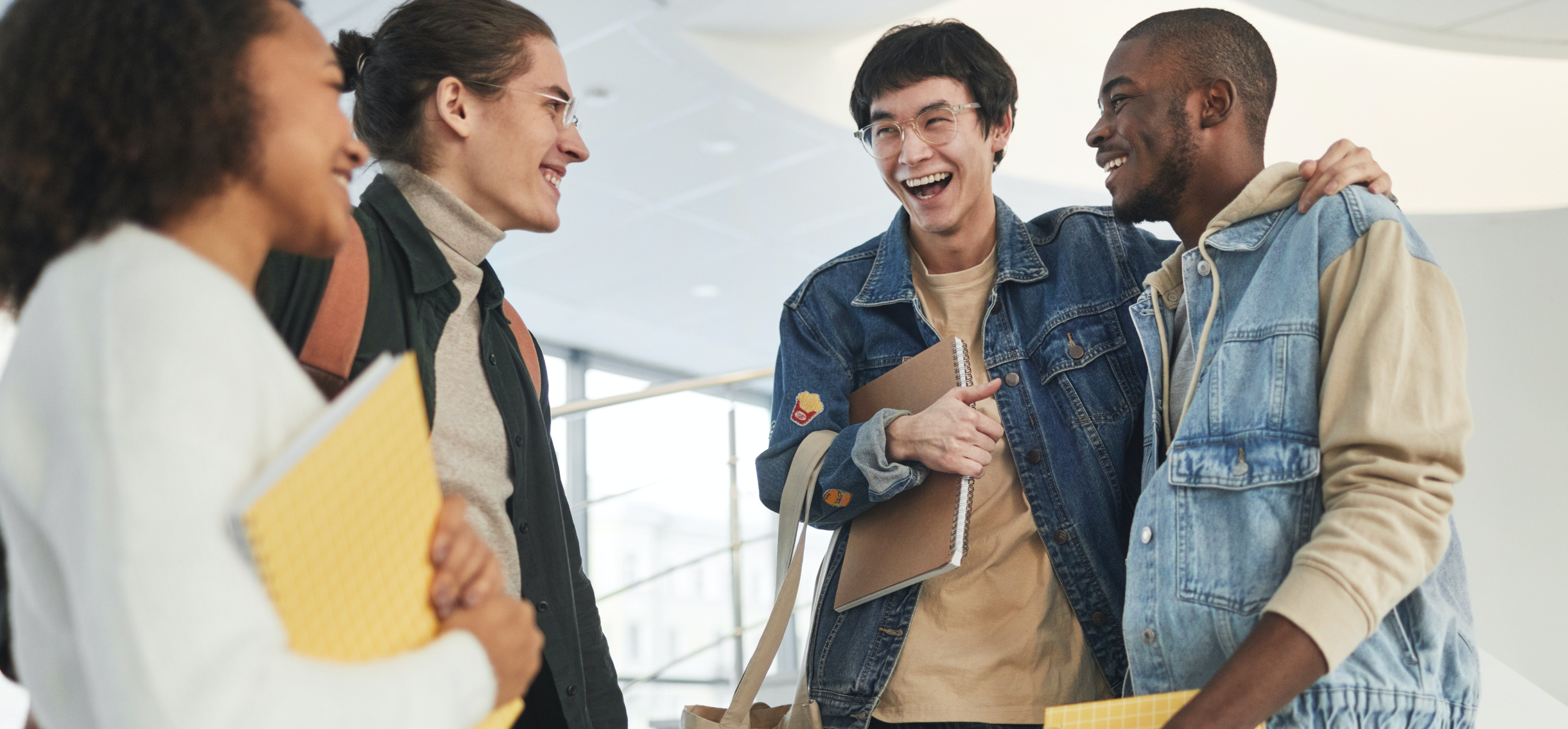 Group of young people hanging out and laughing